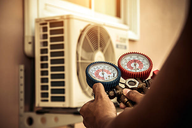 Professional Heat Pump Repair technician working in Minneapolis, KS